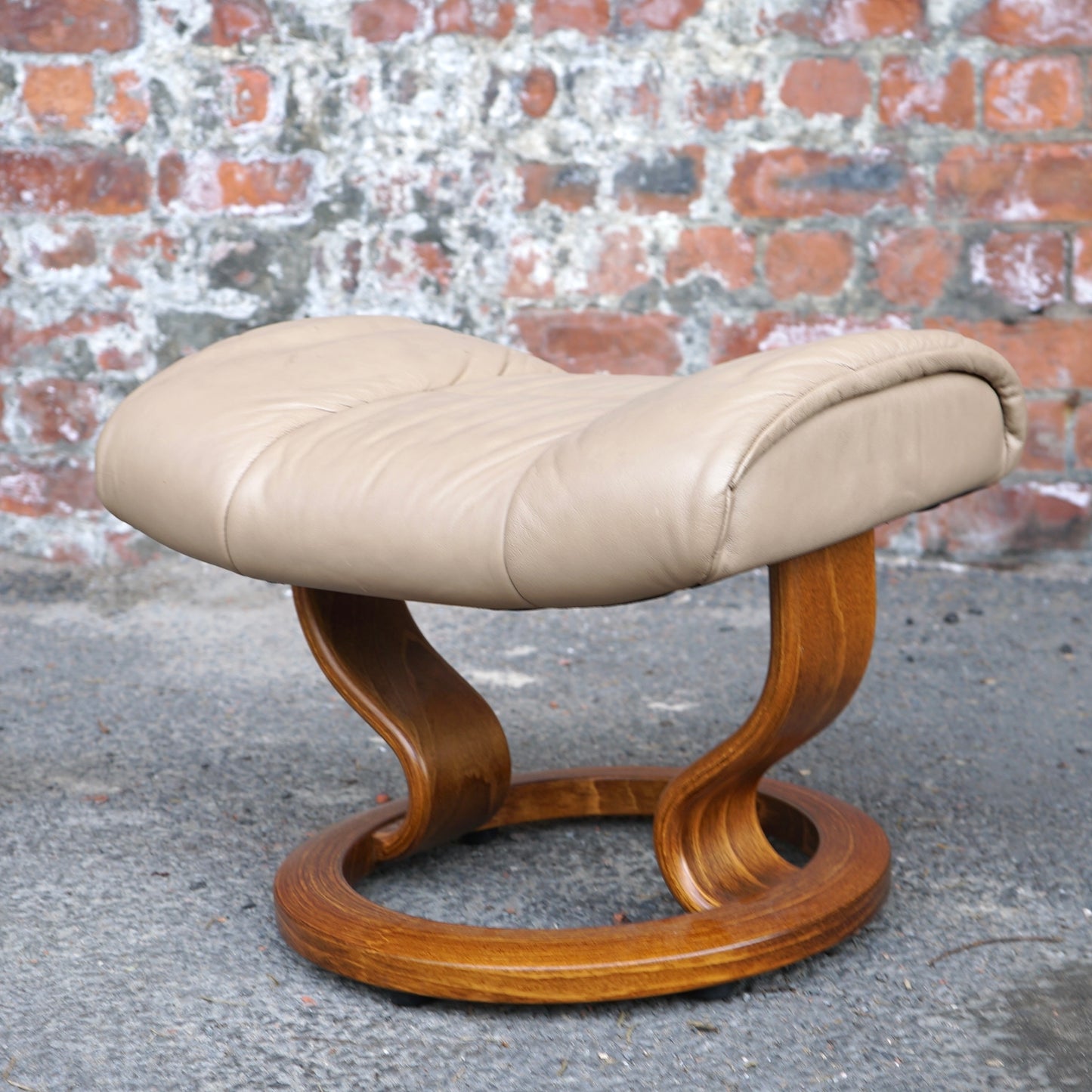 Beige Ekorness Stressless ‘Mayfair’ chair and footstool