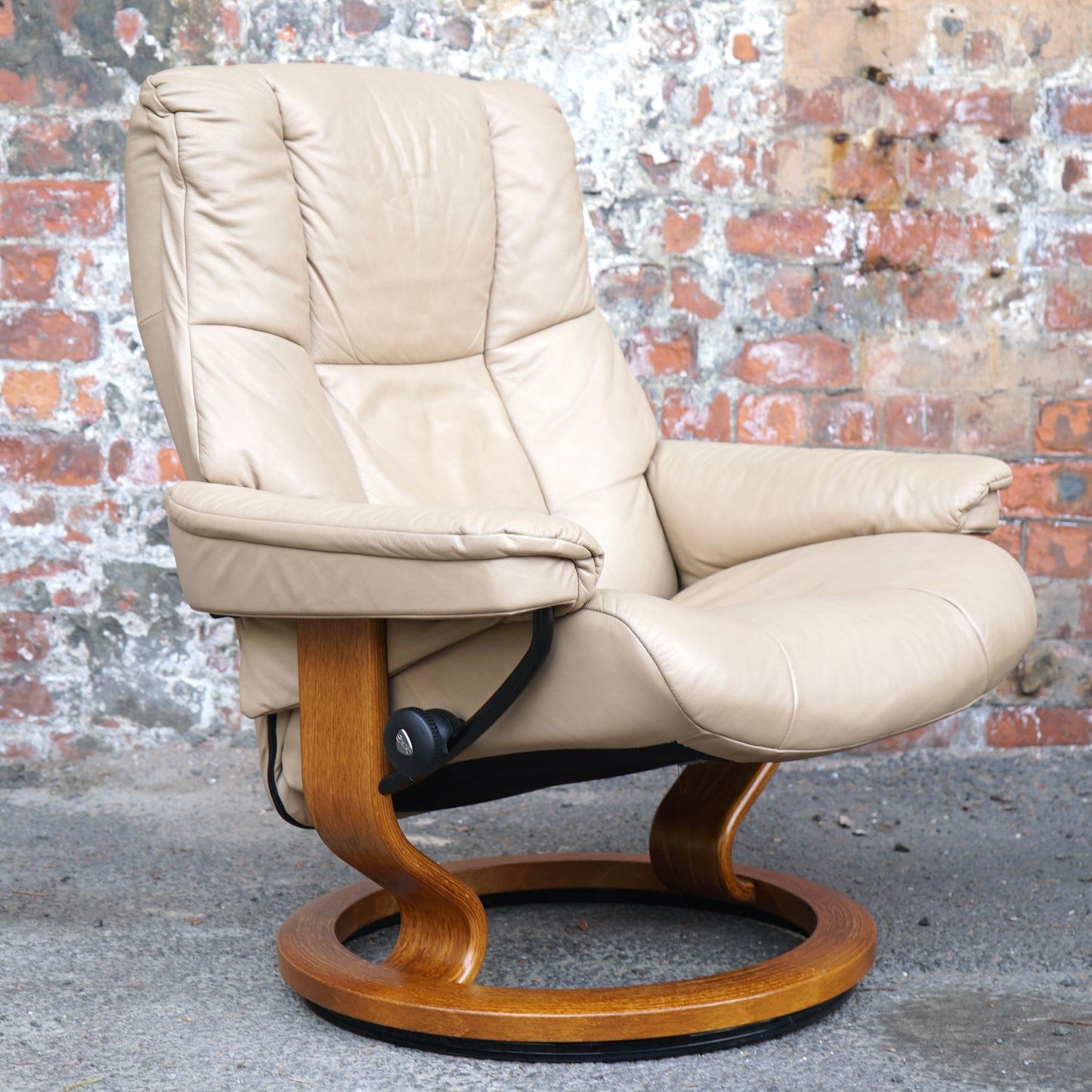 Beige Ekorness Stressless ‘Mayfair’ chair and footstool