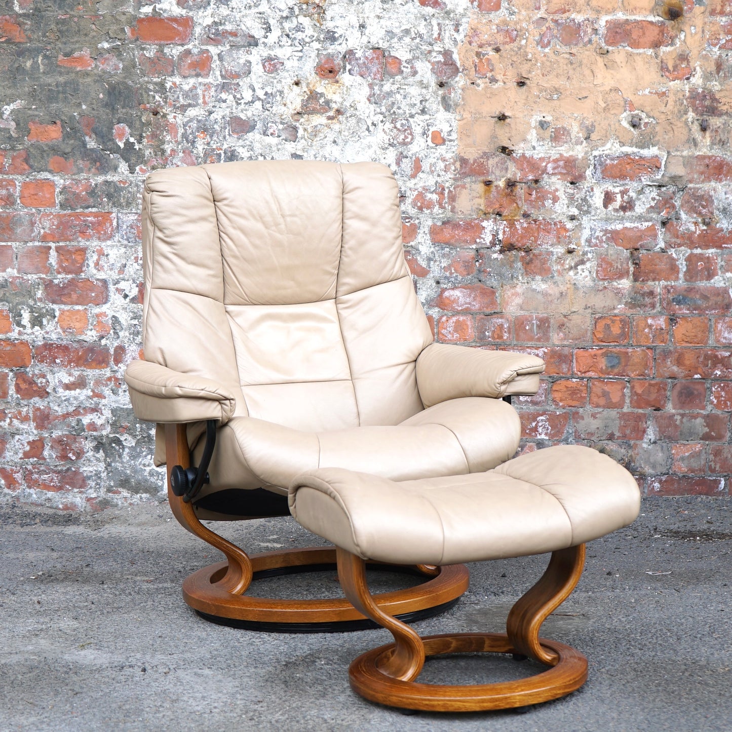 Beige Ekorness Stressless ‘Mayfair’ chair and footstool