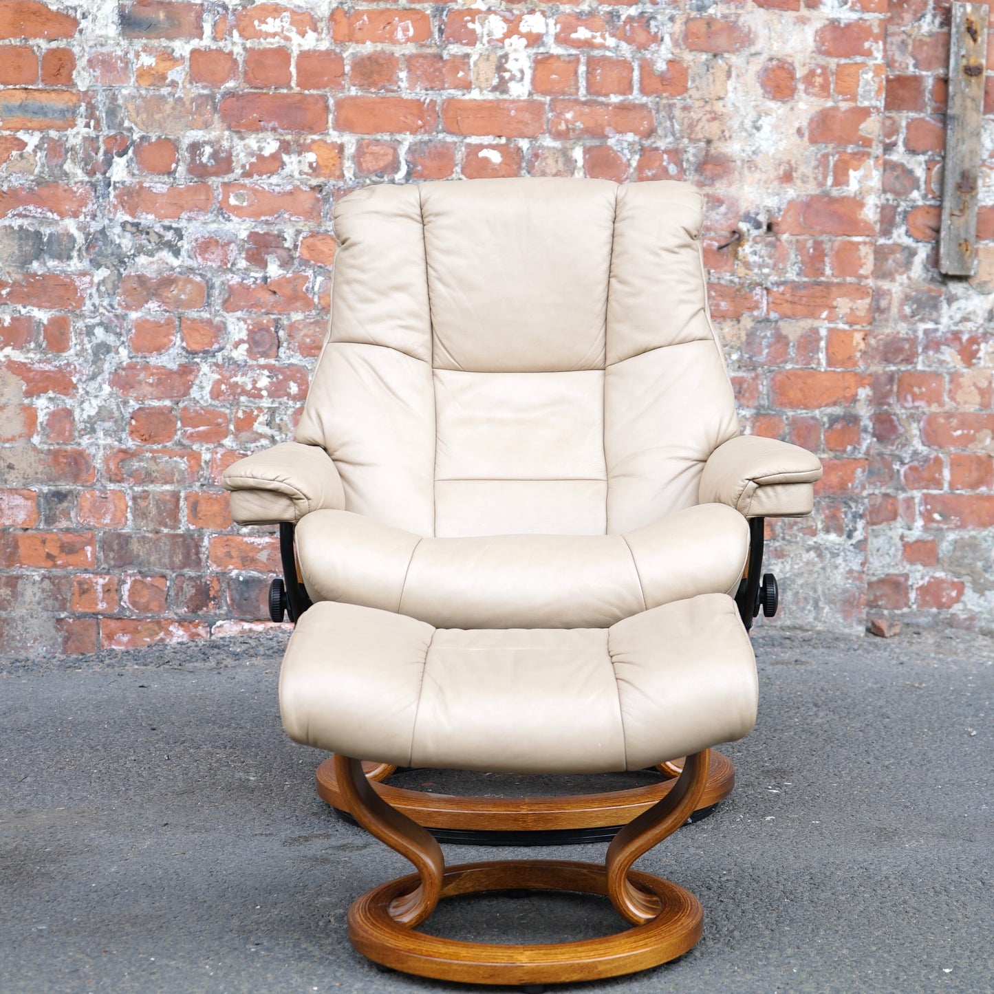 Beige Ekorness Stressless ‘Mayfair’ chair and footstool