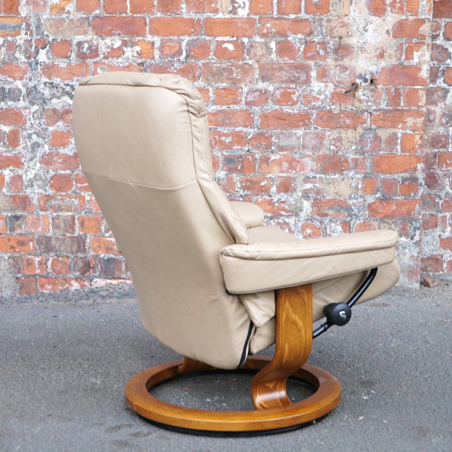 Beige Ekorness Stressless ‘Mayfair’ chair and footstool
