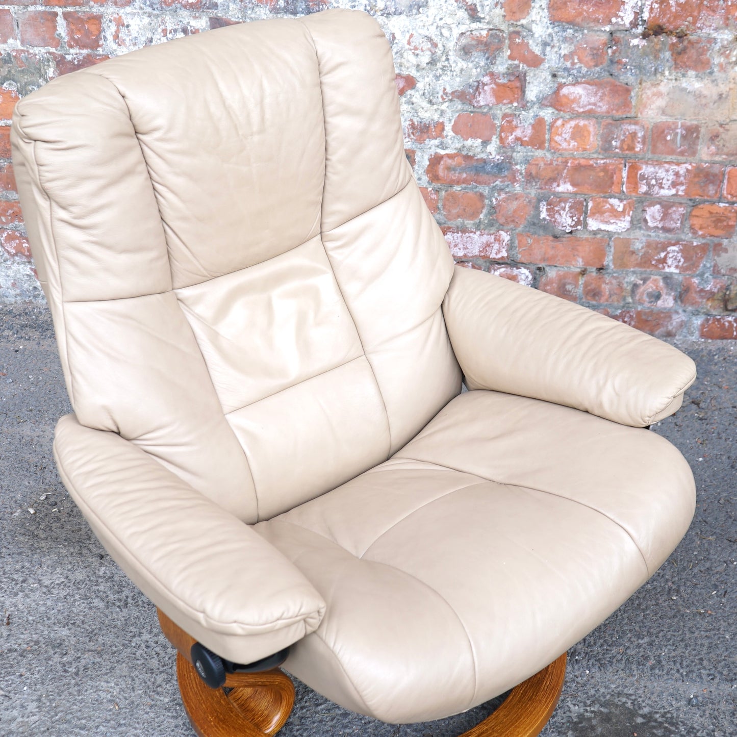 Beige Ekorness Stressless ‘Mayfair’ chair and footstool