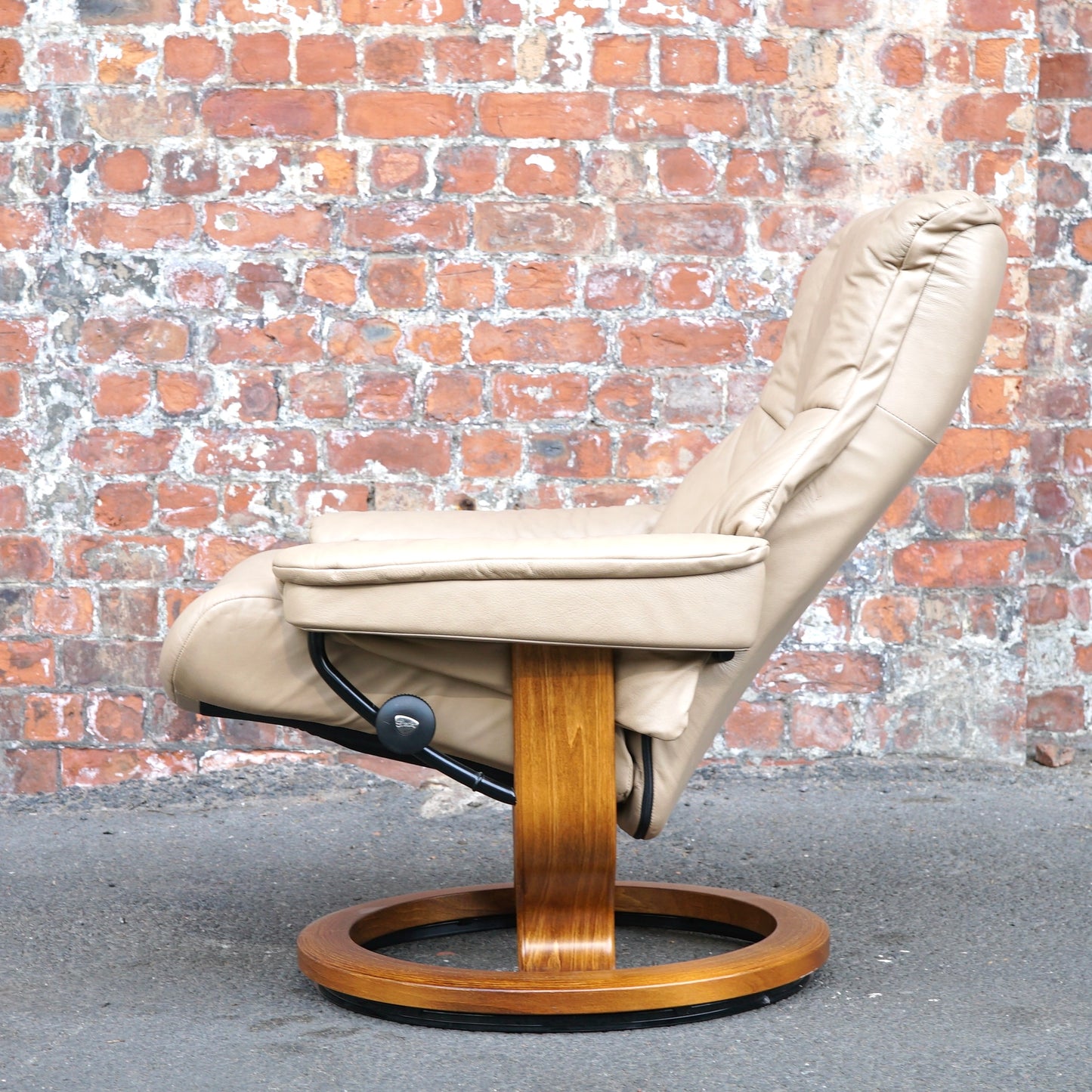 Beige Ekorness Stressless ‘Mayfair’ chair and footstool