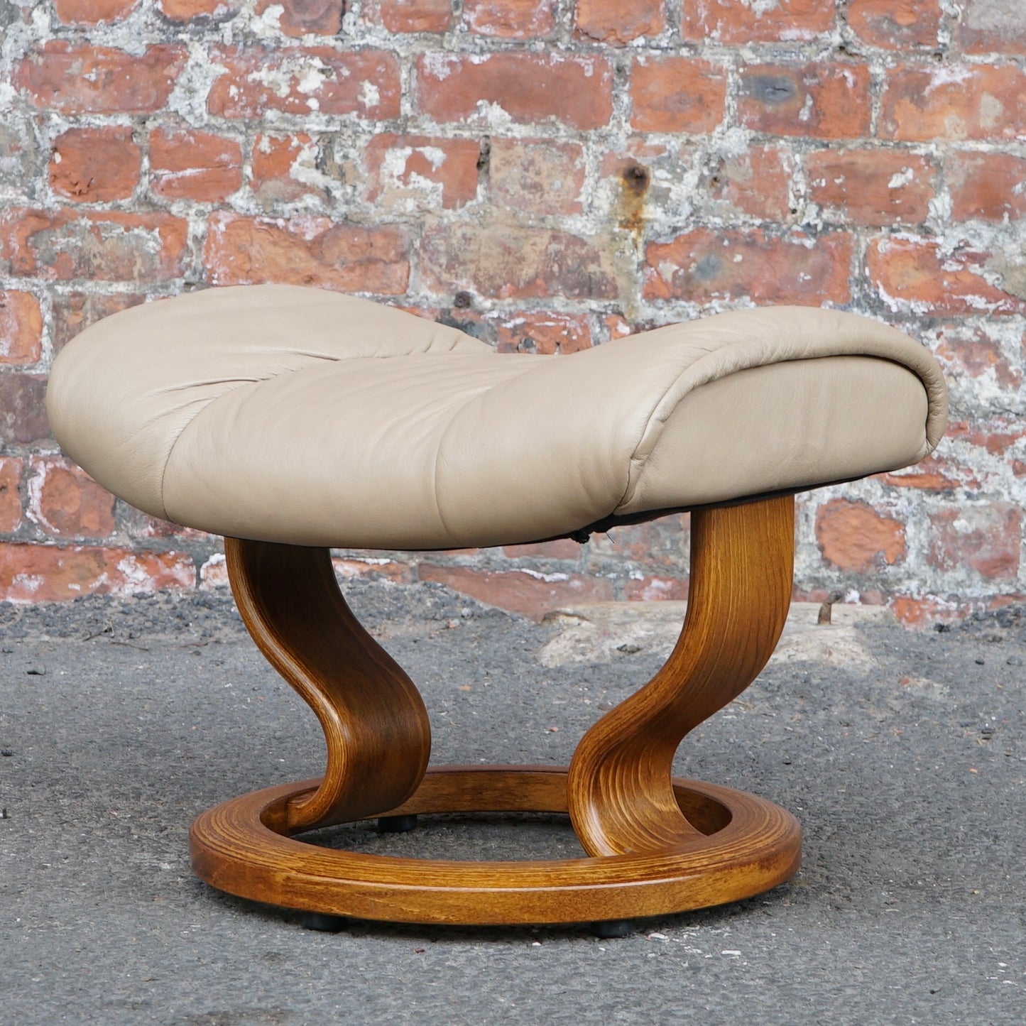 Beige Ekorness Stressless ‘Mayfair’ chair and footstool