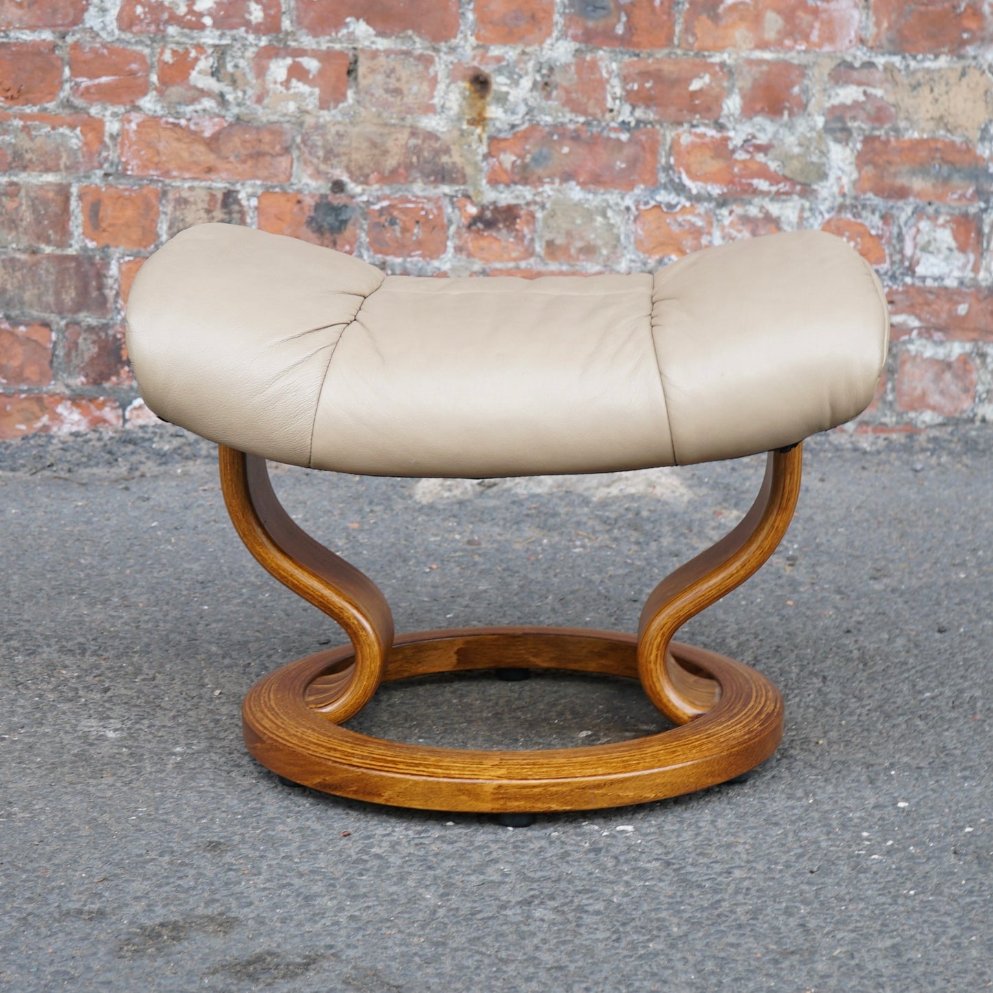 Beige Ekorness Stressless ‘Mayfair’ chair and footstool