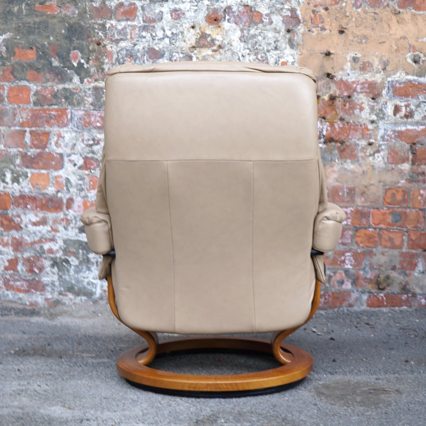 Beige Ekorness Stressless ‘Mayfair’ chair and footstool