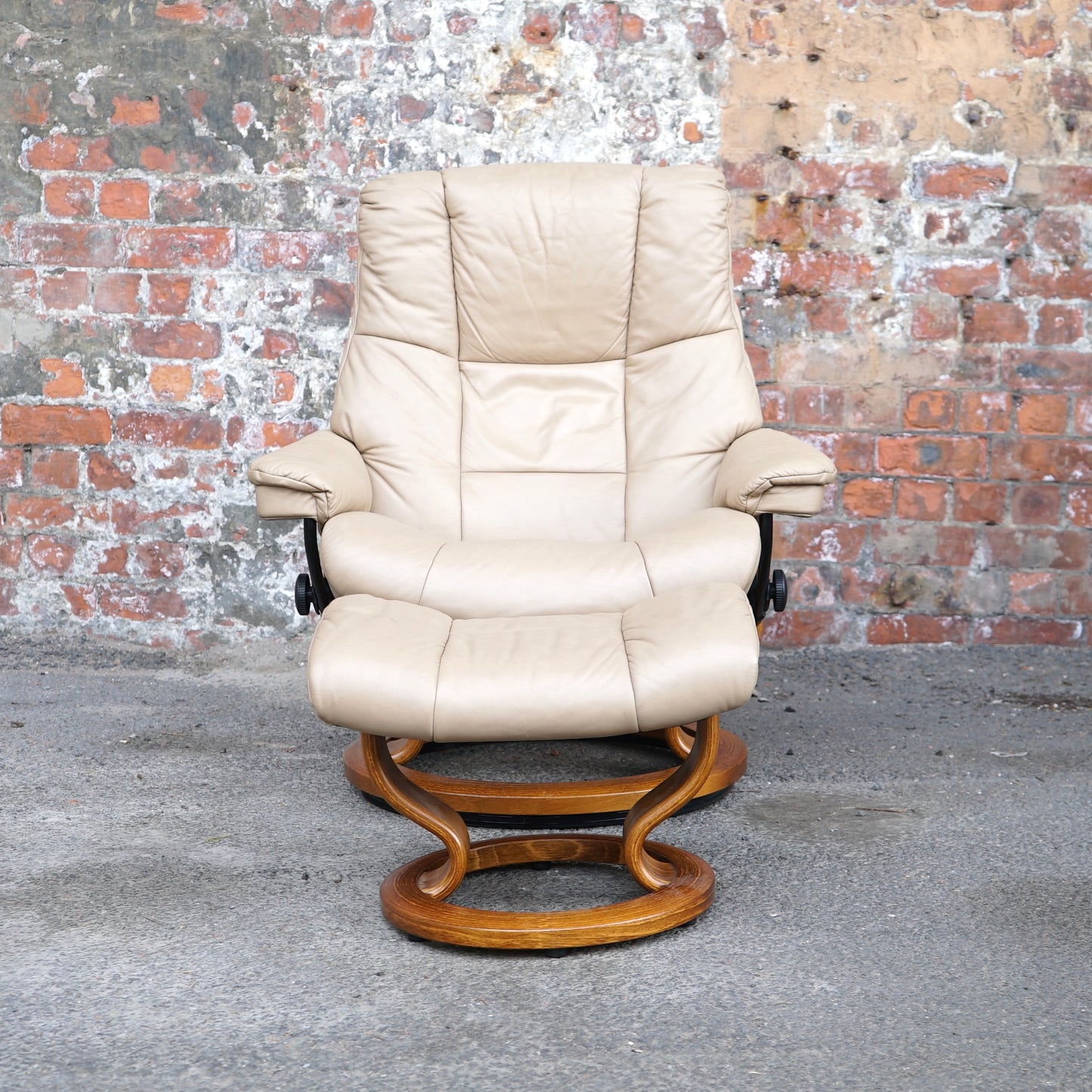 Beige Ekorness Stressless ‘Mayfair’ chair and footstool