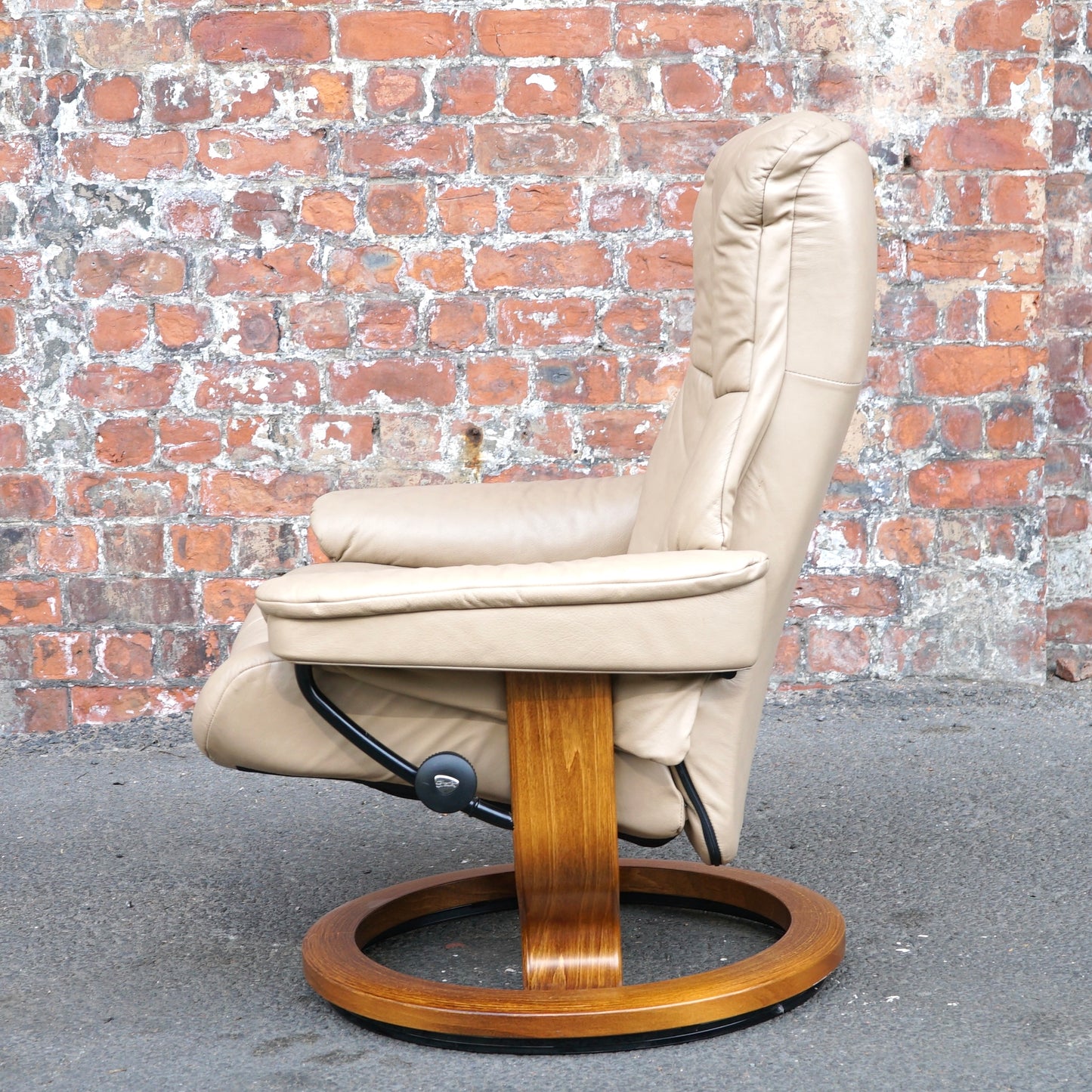 Beige Ekorness Stressless ‘Mayfair’ chair and footstool