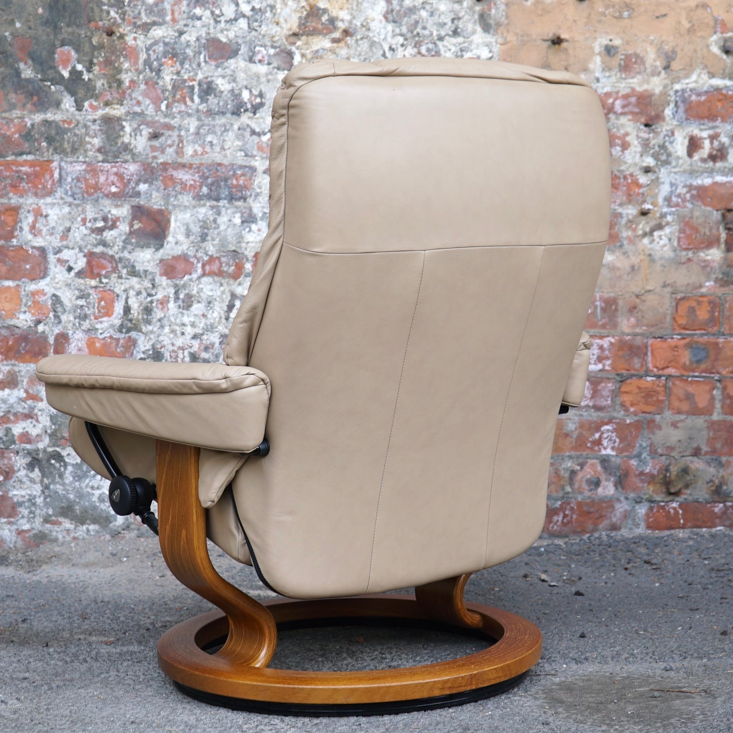 Beige Ekorness Stressless ‘Mayfair’ chair and footstool