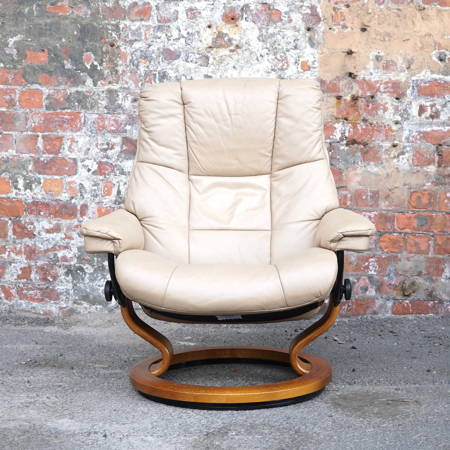Beige Ekorness Stressless ‘Mayfair’ chair and footstool